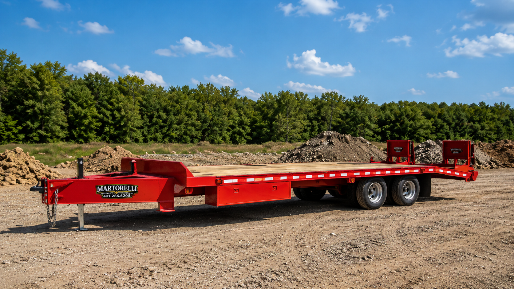 Martorelli Property Services heavy-duty equipment trailer for transporting skid steers and machinery