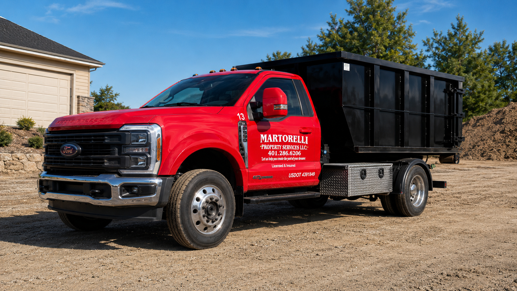 Martorelli Property Services branded red Ford F-550 dump body truck at a Rhode Island job site